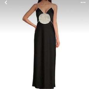 Gianni Bini black and white gown with white rosette detail. NWT size 2